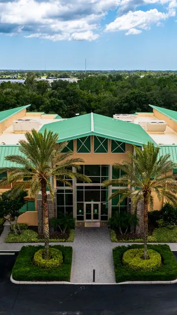 Aerial of a commercial building and parking lot